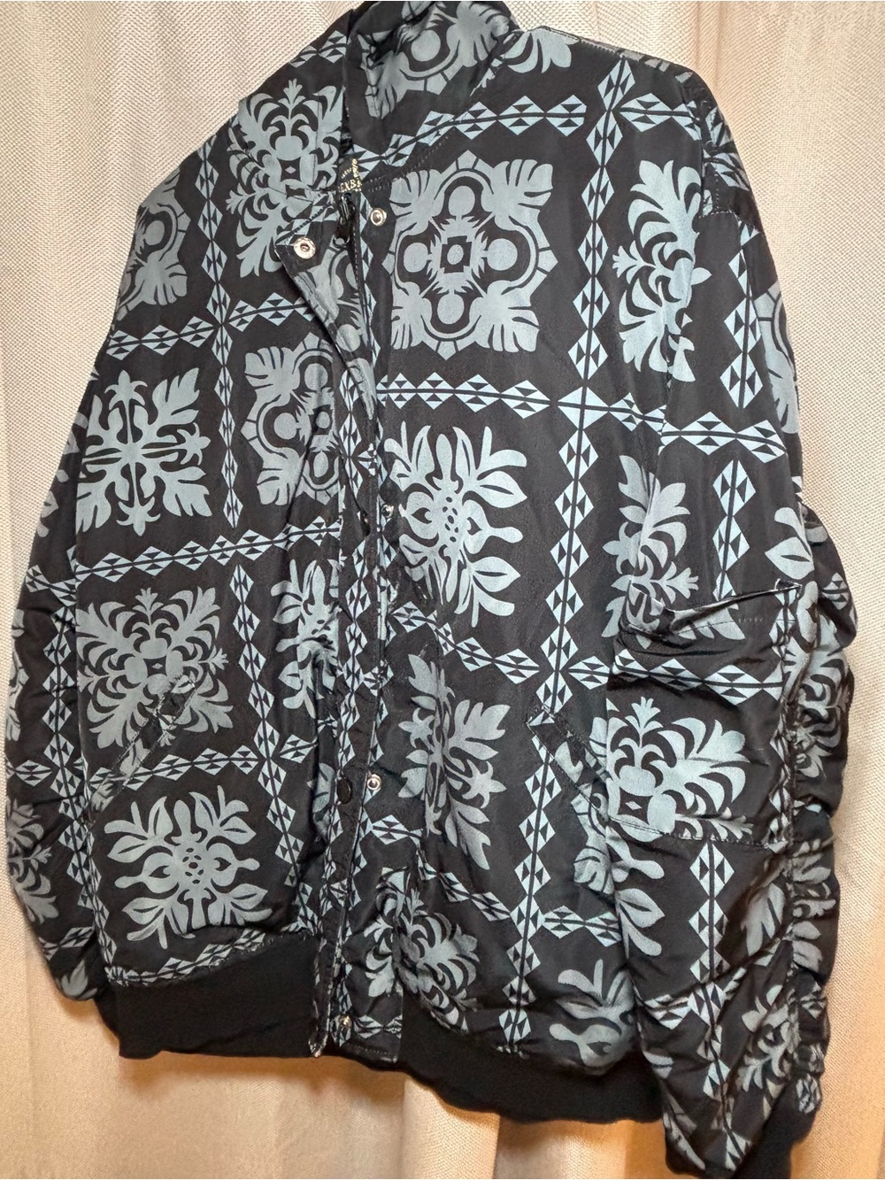 Black Bomber Jacket with Light Blue Patterned Print